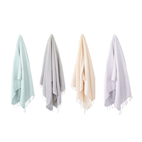 http://www.strayandwander.com/cdn/shop/products/Kai-Turkish-towel-hanging-cover_grande.jpg?v=1619996289